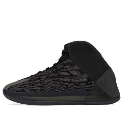 The adidas Yeezy Quantum 'Onyx' is a basketball-inspired mid-top sneaker that deliver a shadowy colorway. The upper is made of mono mesh with embroidered detailing and a synthetic suede toe cap. It also has a neoprene collar for stretchy support, and reflective heel paneling for added visibility in low-light conditions. The full-length Boost midsole is enveloped in a semi-translucent TPU cage for responsive cushioning, and the herringbone-tread rubber outsole provides grippy traction. (SNKR/Unisex/Non-Slip/High Top/Basketball/Shock-absorbing) Mesh High-top Sneakers With Textured Sole For Streetwear, Textured Sole Lace-up Basketball Shoes For Streetwear, Streetwear Basketball Shoes With Boost Midsole And Round Toe, Adidas Custom Sneakers With Translucent Outsole For Streetwear, High-top Basketball Shoes For Streetwear With Boost Midsole, Mid-top Basketball Shoes With Boost Midsole For Streetwear, Streetwear High-top Basketball Shoes With Boost Midsole, Mesh Lace-up Basketball Shoes For Streetwear, Adidas Custom Sneakers For Streetwear With Translucent Outsole