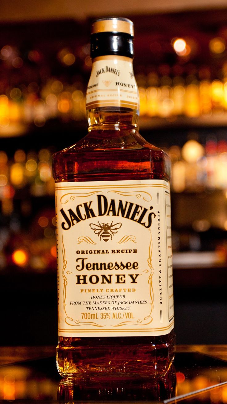 a bottle of jack daniels honey on a table