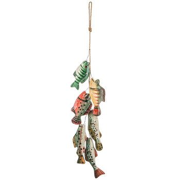 an ornament with fish hanging from it's side on a string,