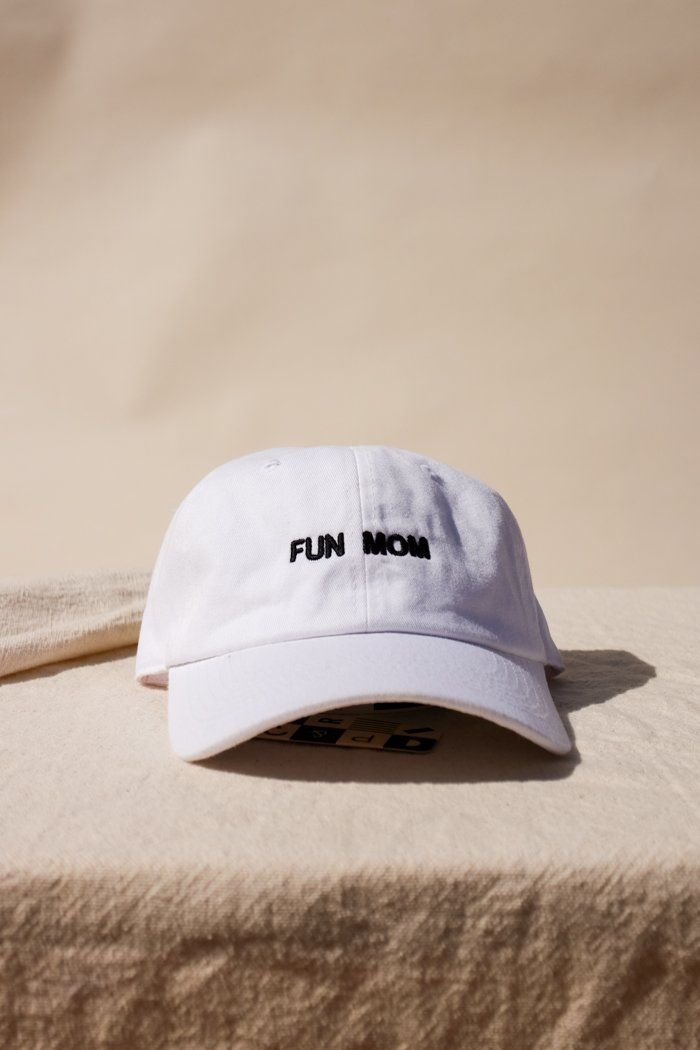 "Im not like a regular mom , I'm a fun mom." Intentionally Blank "Fun Mom" dad hat saying it all for you. cool mom One size. Adjustable back. Hand embroidered in LA. PIPE AND ROW Adjustable Curved Brim Fun Dad Hat, Fun Cotton Hat With Curved Bill, Fun Adjustable Dad Hat, Trendy White Hat With Curved Visor, Trendy White Hats With Curved Visor, Fun Everyday Hats One Size Fits Most, Playful Hats With Letter Print And Curved Brim, Everyday Fun Hats With Curved Brim, White Adjustable Dad Hat With Curved Brim