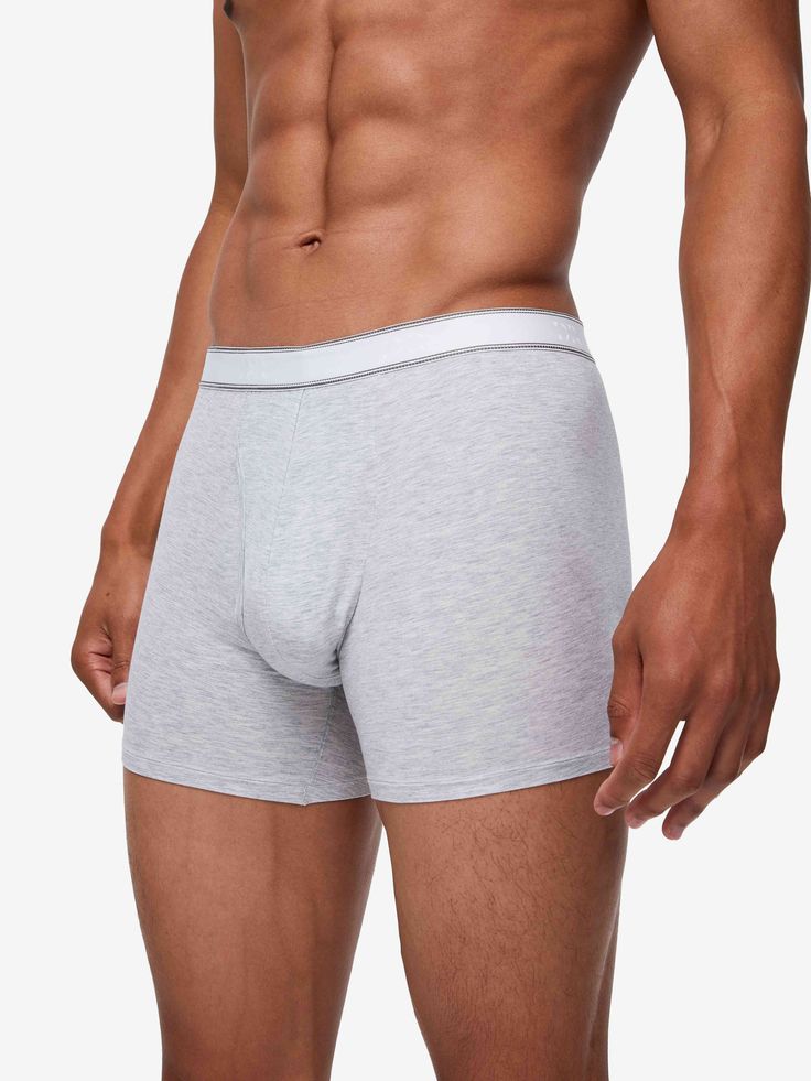 Our Ethan trunks offer a fitted shape, classic open front and longer leg for a minimalist, streamlined look. A subtle silver marl combined with the stretchy softness of a blend of 91% micro modal and 9% elastane creates an underwear that feels and looks fantastic. Thermostatic properties in the micro modal fibres allow them to react to changes in temperature and regulate your body heat. What's more, the fabric is also environmentally friendly. The Ethan is the lightest weight of micro modal, mak Derek Rose, Mens Trunks, Service Learning, Gift Wrapping Services, Body Heat, Silver Man, Long Legs, Free Shopping, Suits You