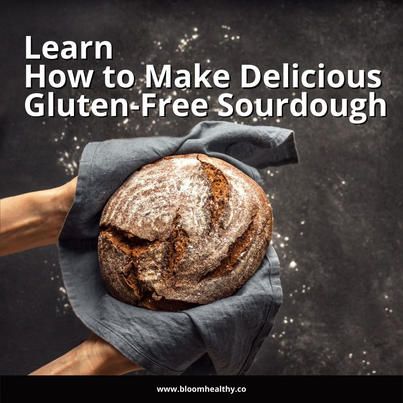 a person holding a loaf of bread with the title learn how to make delicious gluten - free sourdough