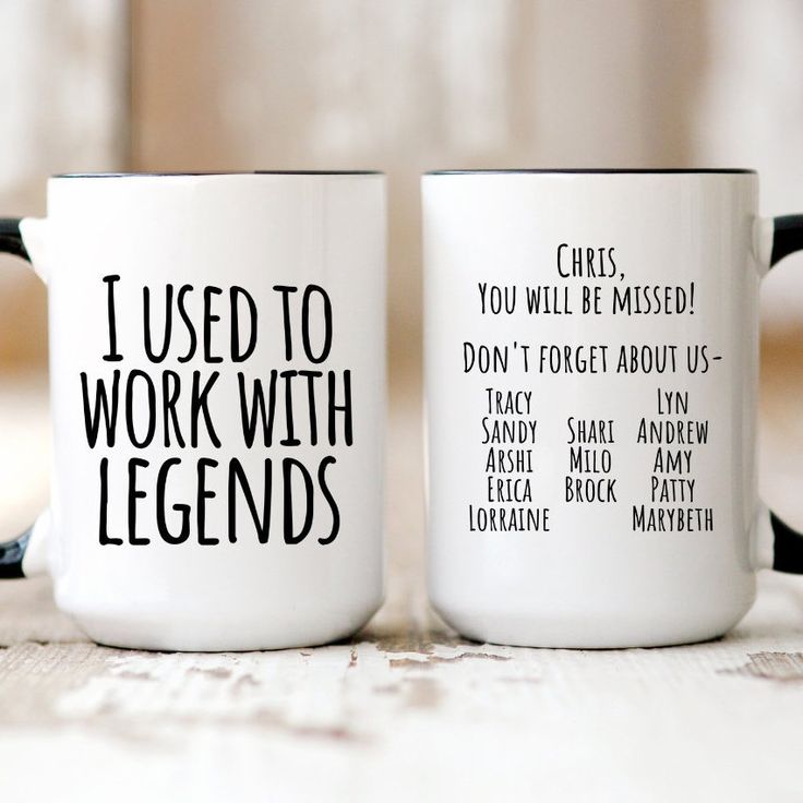 two coffee mugs that have words on them