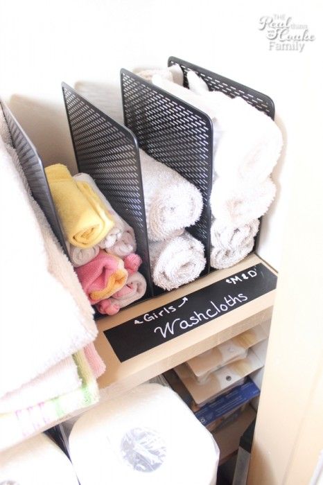 a shelf with towels and other items on it