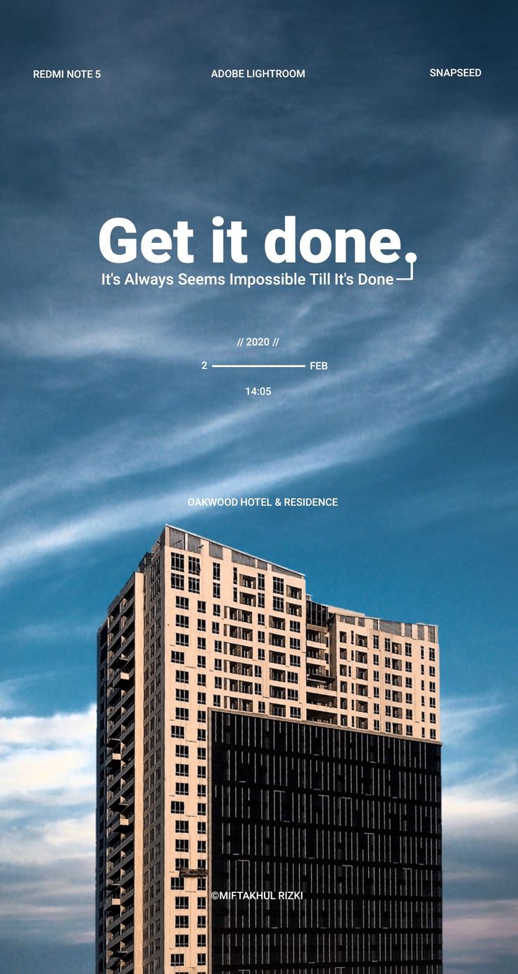 a tall building with the words get it done