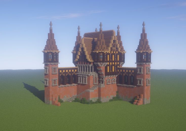 a very large building with two towers on the front and one at the back in minecraft