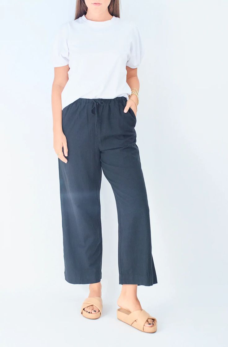 Classic Drawstring Pant – Driftwood Maui #pants #drawstringpants #blackpants #comfy #chic #style #basics #classic #essentials #wfh #travelstyle #rhythm #driftwoodmaui #maui #hawaii #shopsmall Everyday Wide-leg Pants With Drawstring, Everyday Wide Leg Pants With Drawstring, Everyday Wide Leg Drawstring Pants, Relaxed Drawstring Pants For Everyday, Breezy Relaxed Fit Loungewear Bottoms, Relaxed Everyday Bottoms With Drawstring, Relaxed Straight Pants With Drawstring, Summer Pants With Drawstring For Everyday Wear, Breezy Loungewear Pants With Elastic Waistband