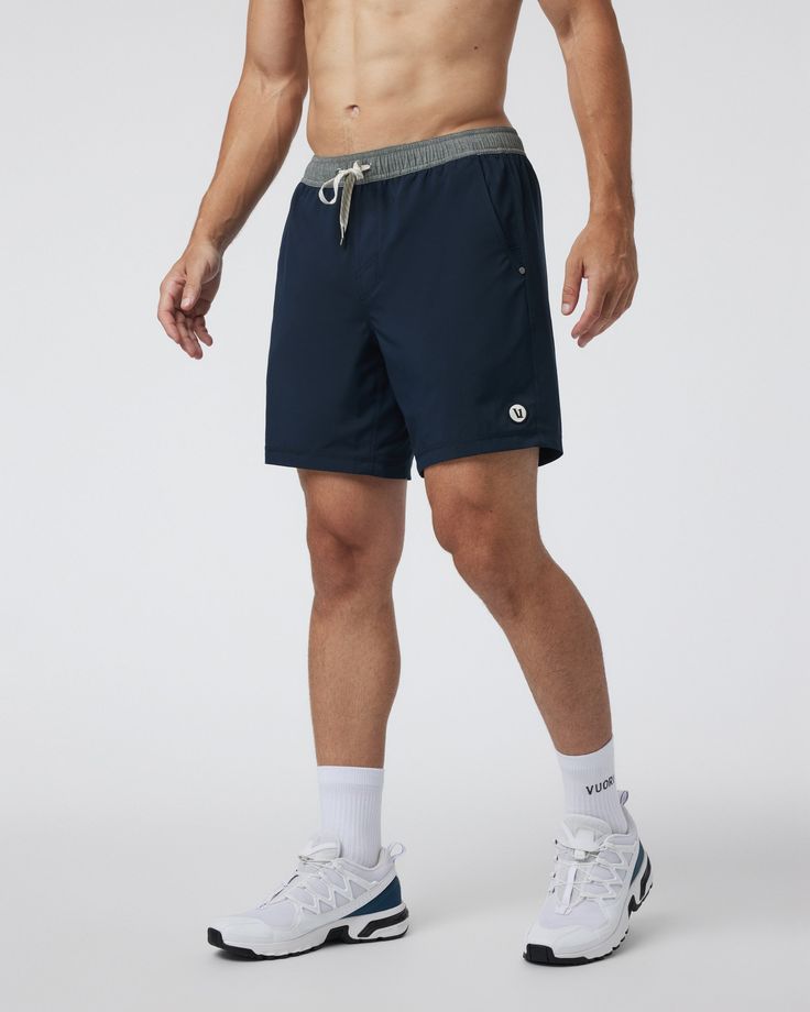 One short for every sport, the Kore Shorts have a classic athletic fit, falling just above the knee with an anywhere and everywhere versatility. Go commando in confidence with the breathable, boxer-brief liner. | Vuori Kore Shorts | Ink | XXL Vuori makes premium performance apparel inspired by the active Coastal California lifestyle; an integration of fitness, surf, sport, and art. Breaking down the boundaries of traditional activewear, we are a new perspective on performance apparel. Casual Boxer Briefs With Elastic Waistband For Workout, Casual Boxer Briefs For Workout With Elastic Waistband, Casual Workout Boxer Briefs With Elastic Waistband, Sporty Navy Bottoms For Outdoor Activities, Sporty Navy Bottoms For Outdoor, Sporty Athletic Shorts With Comfort Waistband, Sporty Nylon Athletic Shorts With Comfort Waistband, Sporty Go-dry Athletic Shorts For Outdoor, Casual Sports Boxer Briefs With Elastic Waistband