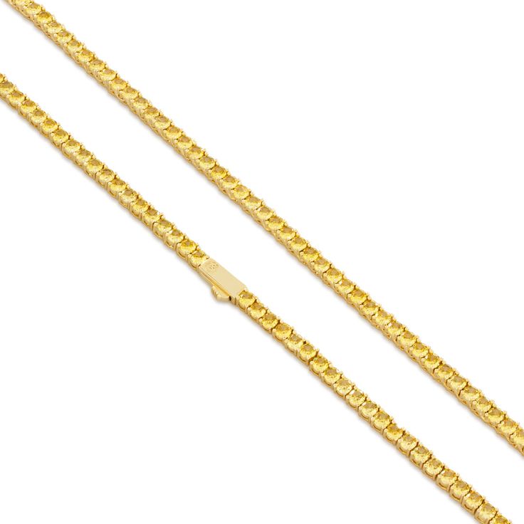 Introducing our 4mm Citrine Tennis Chain by King Ice, adorned with stunning yellow stones. Elevate your outfit effortlessly with this eye-catching accessory. Perfect for any occasion, it adds a pop of color and charm to your look. Get yours today and stand out. Elegant Yellow Necklace With Figaro Chain, Elegant Yellow Box Chain Necklace, Elevate Your Outfit, Jewelry King, Tennis Chain, Yellow Stone, Hip Hop Jewelry, Stone Cuts, Black Stone