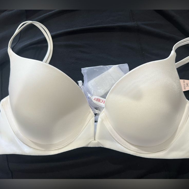 34c, Extra Straps To Use Multiple Ways. Does Have Some Discoloring Inside The Bra From Been Saved Too Long See Pic For Details. White Shaping Bra With Removable Pads, Shaping White Bra With Removable Pads, White Seamless Push-up Bra, Victoria's Secret Push-up Bra With Padded Cups, Victoria's Secret Padded Push-up Bra, Victoria's Secret Seamless Push-up Bra, White Seamless Underwire Bra, Victoria's Secret Full Coverage Bra With Removable Pads, White Stretch Underwire Nursing Bra