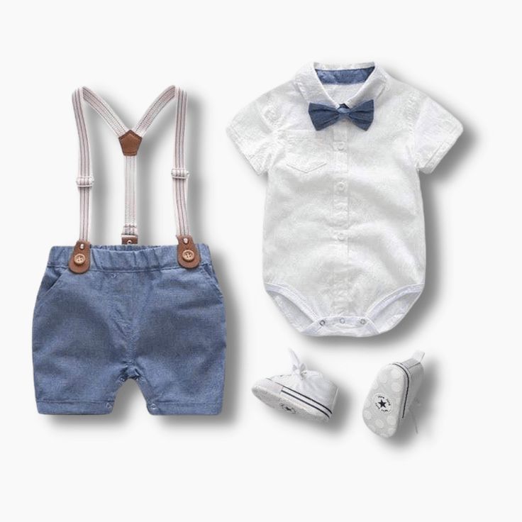 Dress your little boy in style and comfort with our Baby Boy Tie and Suspenders set! This adorable outfit is the perfect choice for your little ones, combining fashion and convenience for a charming look. The set features a short-sleeve shirt with a classic bowtie and matching suspenders shorts, creating a cool and fashionable ensemble. The turn-down collar design adds a touch of sophistication, making your baby boy look dapper and stylish. Crafted with care, the shirt comes with 3 snaps at the Fitted Short Sleeve Sets For Playtime, Light Blue Cotton Sets For Summer, Light Blue Short Sleeve Sets For Spring, Light Blue Short Sleeve Sets For Summer, Light Blue Short Sleeve Spring Sets, Light Blue Short Sleeve Summer Sets, Classic Cotton Set For Spring, Classic Short Sleeve Sets For Spring, Light Blue Fitted Short Sleeve Sets