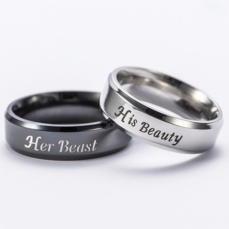 two wedding rings with the words his beauty and her beast engraved on each one side