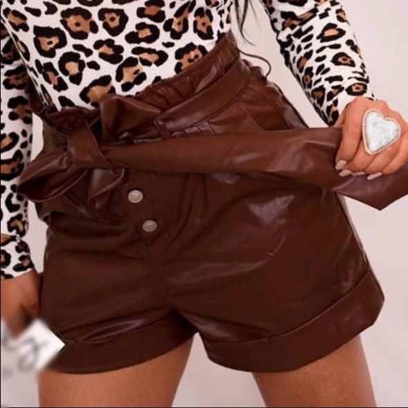 **New! Never Worn! No Tags, No Price Tags, No Flaws!** -Brand: White Birch -Size: Large-(Oversized) -Color: Brown -Style: Faux Leather Shorts W/ Adjustable Belt -Material: 50% Poly Urethane 47% Polyester 3% Spandex -Accents: Button Closure -Inseam: 5 Inches , Waist: 18 Inches Flat , Rise: 15-16 Inch Trendy Shorts For Fall Going Out, Trendy Shorts For Going Out In Fall, Trendy Leather Bottoms For Day Out, Trendy Brown Shorts For Day Out, Summer Brown Faux Leather Bottoms, Trendy Fall Shorts For Going Out, Brown Faux Leather Shorts For Spring, Trendy Leather Shorts For Fall, Leather Bottoms For Day Out In Fall