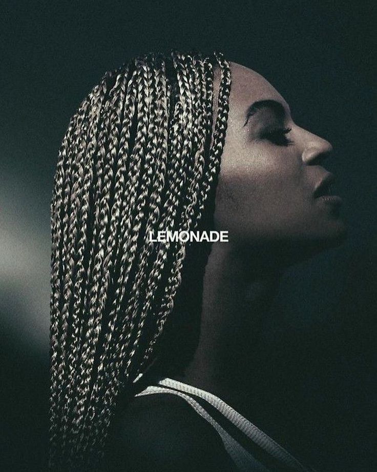 a woman with braids on her head and the words lemonade in front of her face