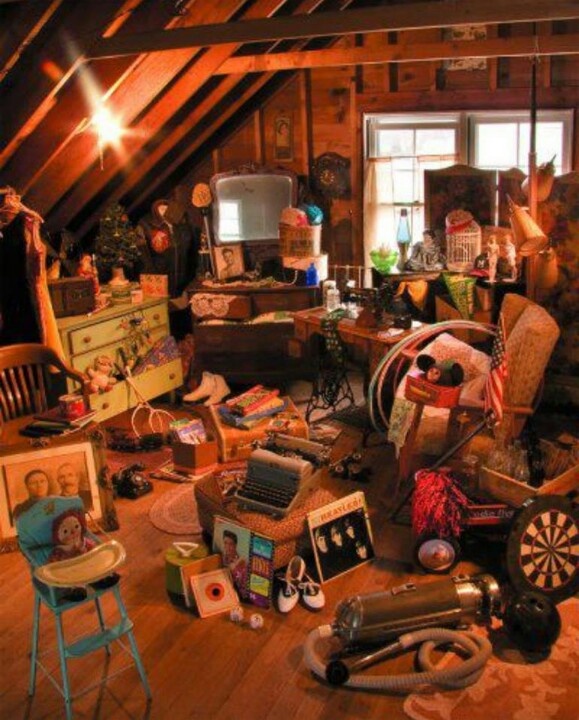 a room filled with furniture and lots of clutter on top of a wooden floor