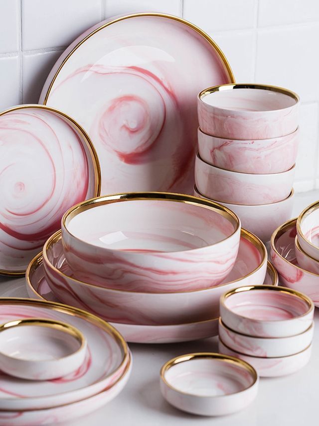 pink and white marble dinnerware set with gold rims