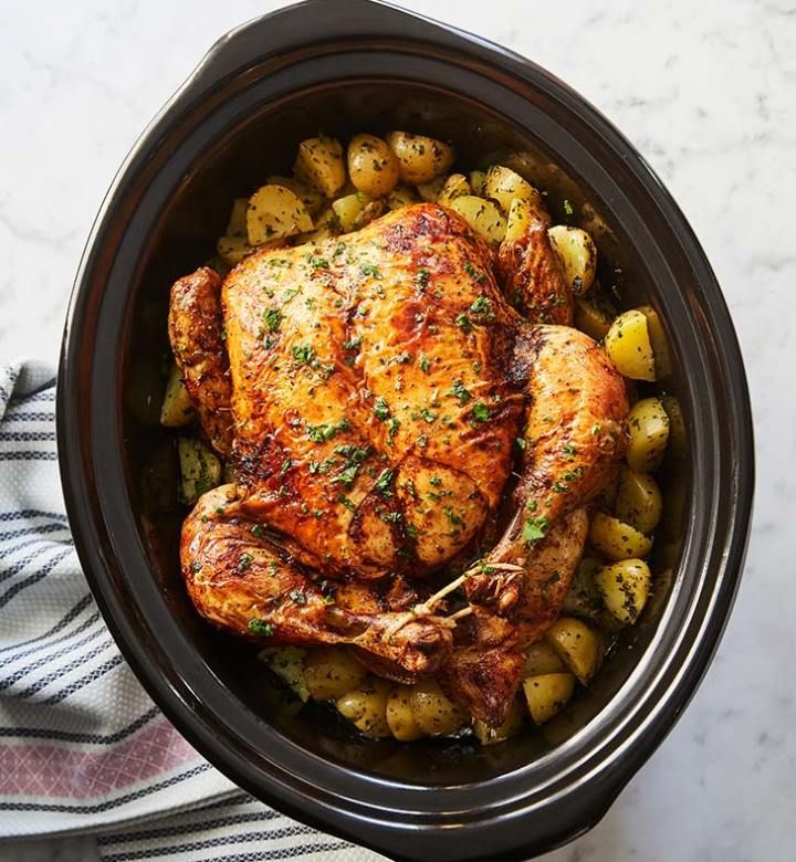 a chicken and potatoes dish in a crock pot