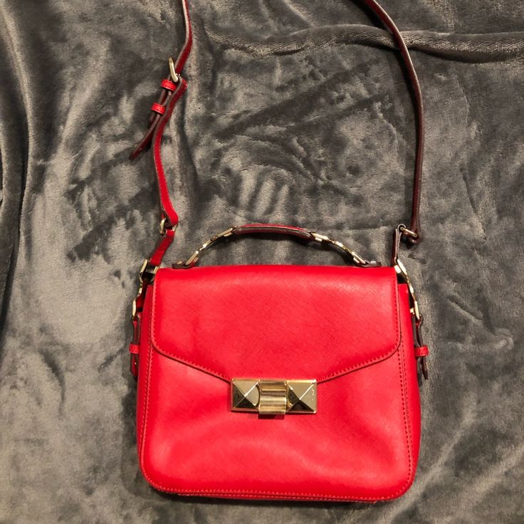 Ann Taylor Lady Bag In Red, Nwt (New With Tags) Original Retail Price $178 The Perfect Leather Structured Bag In Red With Gold Hardware! Has Upper Handle, Cross-Baby (Messenger) Strap, 2 Phone Pockets And Inside Zip Pocket. The Pyramid Gold-Tone Clasp Adds A Nice Touch To The Simple Bag. Questions? Leave A Comment Below! Designer Red Flap Bag For Shopping, Classic Red Flap Bag For Shopping, Red Flap Bag With Detachable Handle For Travel, Red Everyday Top Handle Flap Bag, Red Top Handle Flap Bag For Shopping, Red Top Handle Flap Bag For Everyday Use, Red Flap Bag With Removable Pouch And Top Handle, Designer Red Flap Shoulder Bag, Red Flap Bag For Shopping