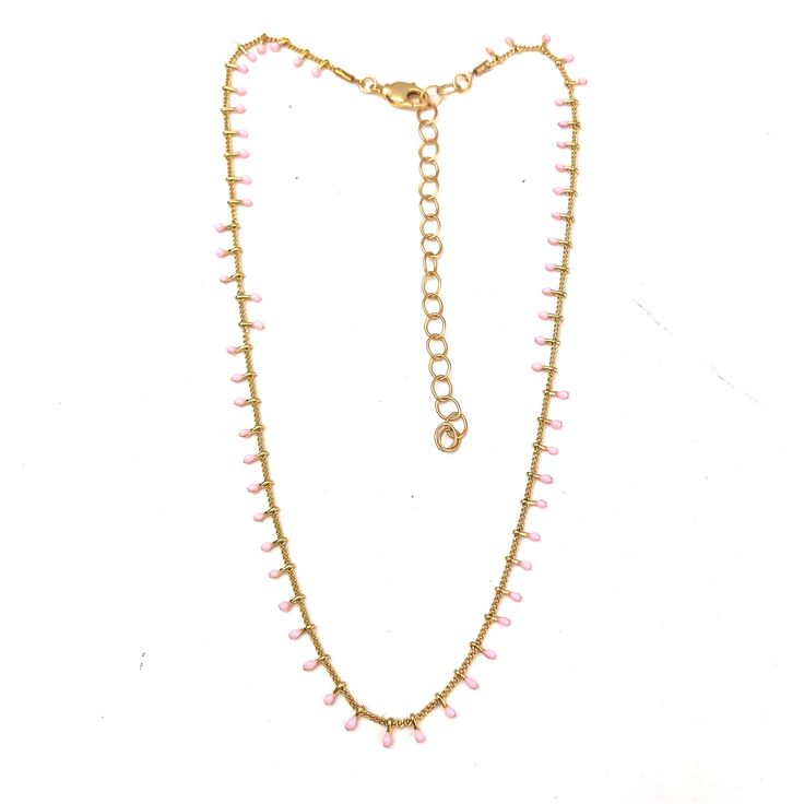 A staple for your layering necklace collection. Delicate & darling pink pastel mini charms cascade off of 24k gold plated chain. One of our 'shortie' lengths, this piece measures 15.5" at the shortest plus an adjustable 4" extender, you can click the lobster swivel clasp into any of the links. You know you love the layering trend and this is a classic you'll wear all the time. Pastel Mini, Necklace Collection, The Lobster, Mini Charm, Pink Pastel, Swiss Dot, Layering Necklace, Gold Plated Chains, Layered Necklaces