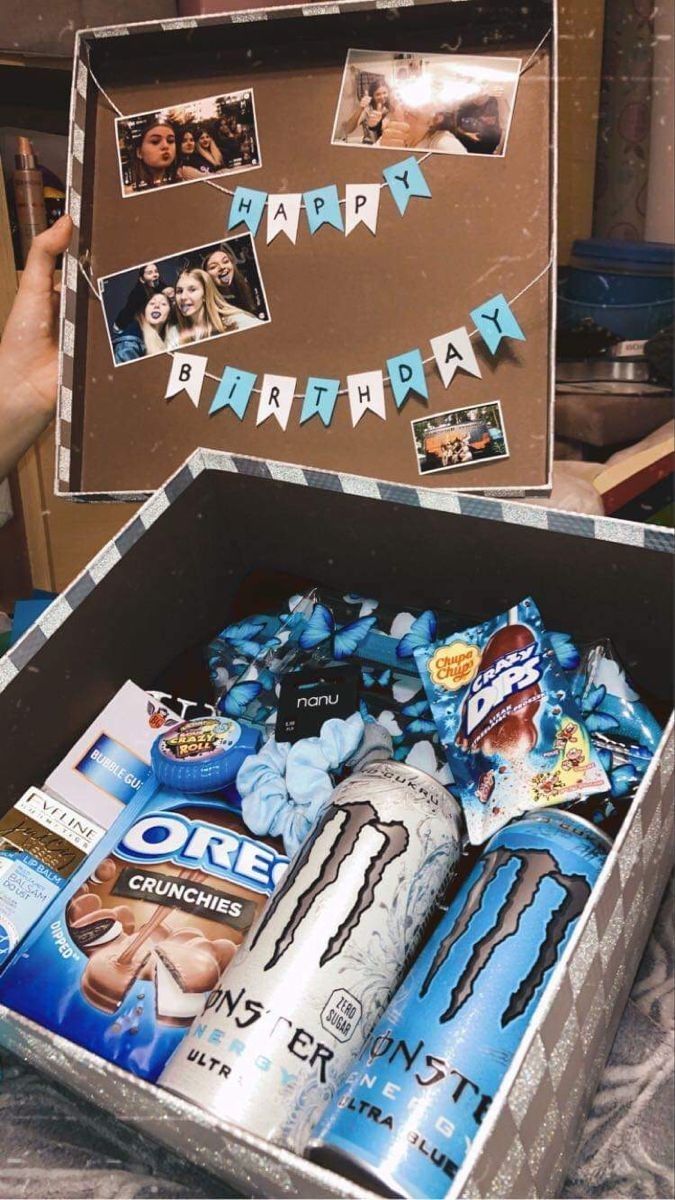 an open box filled with lots of different types of party items and pictures on it