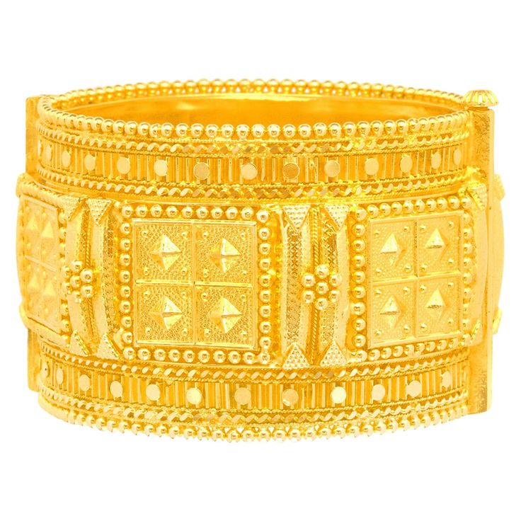 Circa 1950s, 22k, Mumbai, India. This gorgeous fifties Mogul-style bracelet is exquisitely detailed, visually dynamic folkloric jewelry. Its look seamlessly mixes old-world charm with modern fashion. It stands alone or plays nicely with smaller bangles mixed in. Well made, it is in excellent condition. Noted: Pictured on model with earrings Inv. #25543 Remark: "A superbly made and stylishly designed treasure.” SIZE: fits a smaller wrist WEIGHT: 57.2 grams STONES: None HALLMARKS: 22k and maker's mark STOCK NUMBER: 25492 Jewelry acquired from this dealer must delight you. Purchases may be returned for any reason for a period of 7 days. Mumbai India, Gold Bangle, Maker's Mark, Old World Charm, Modern Fashion, Gold Bangles, Makers Mark, Fashion Bracelets, Old World