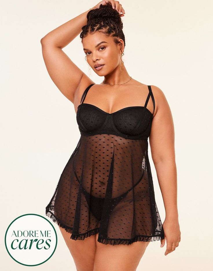 Our plus-size babydoll in jet black features sheer dot mesh with cut-out and elastic detail at the cups. This ruffle-trimmed piece has a full skirt, back hook & eye closure with a keyhole cutout—it also comes with a matching g-string panty. (Available in plus-sizes XL-4X.) Plus Size Lingerie Outfit Night, Halloween Lingerie, Lingerie Outfit Night, Chic Bra, Lingerie Outfit, Adore Me, Babydoll Lingerie, Costume Shop, Bra And Panty Sets