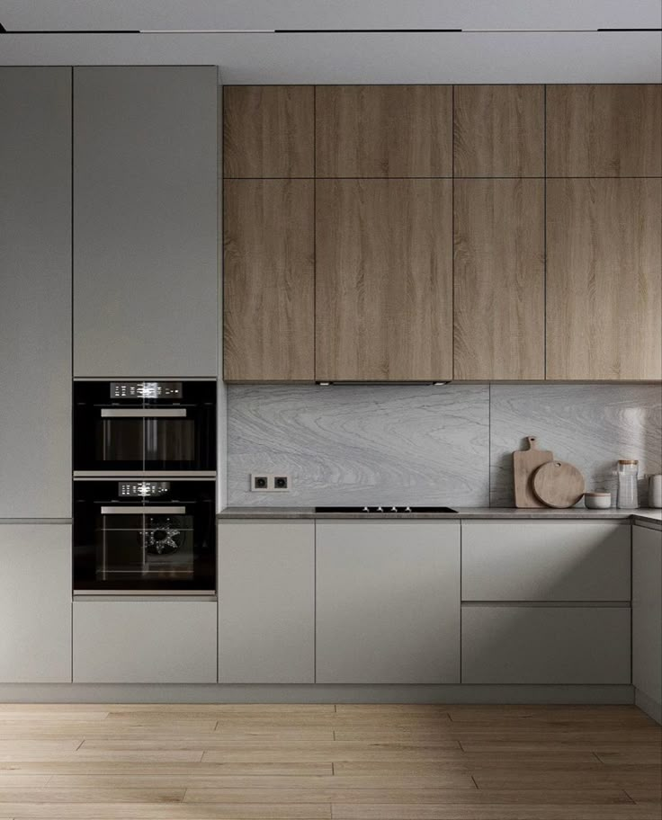 a modern kitchen with wooden cabinets and stainless steel appliances