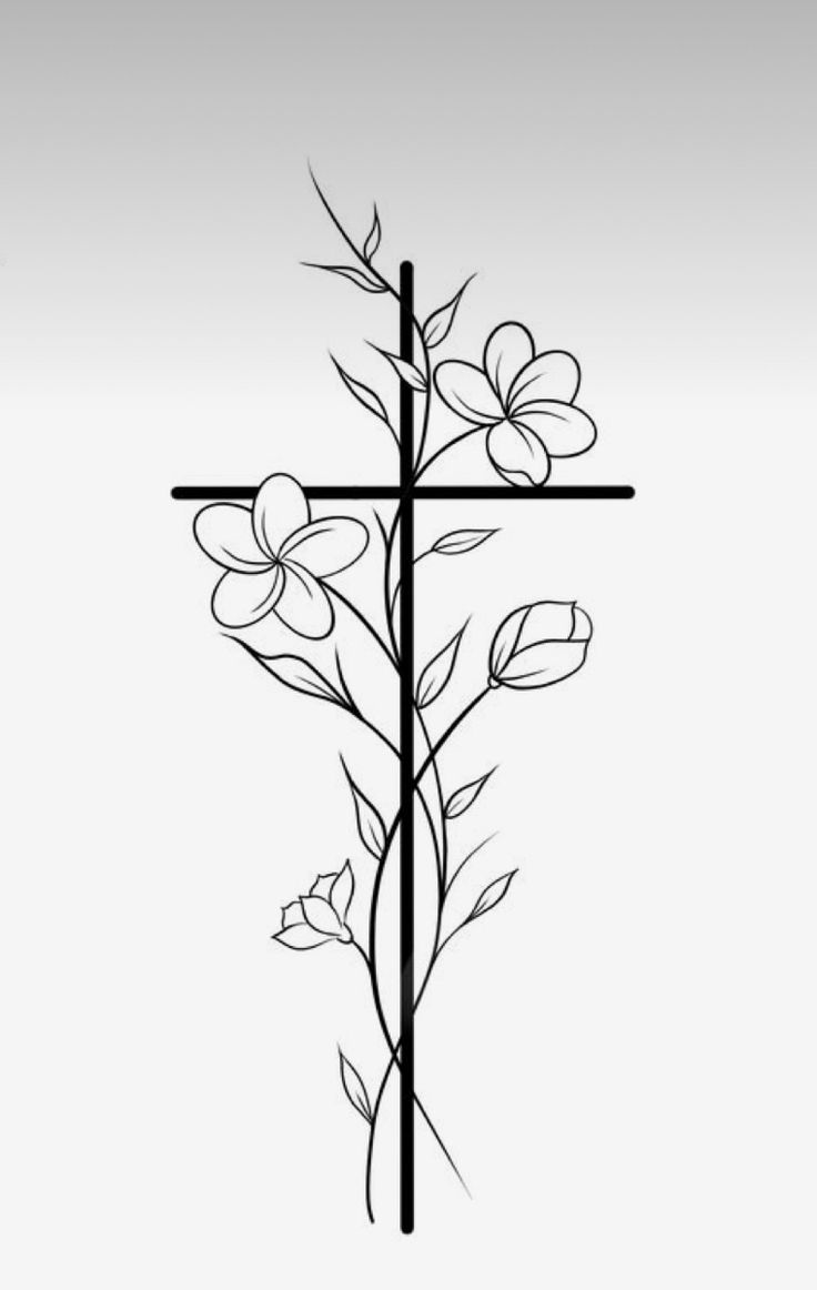 a cross with flowers on it in black and white