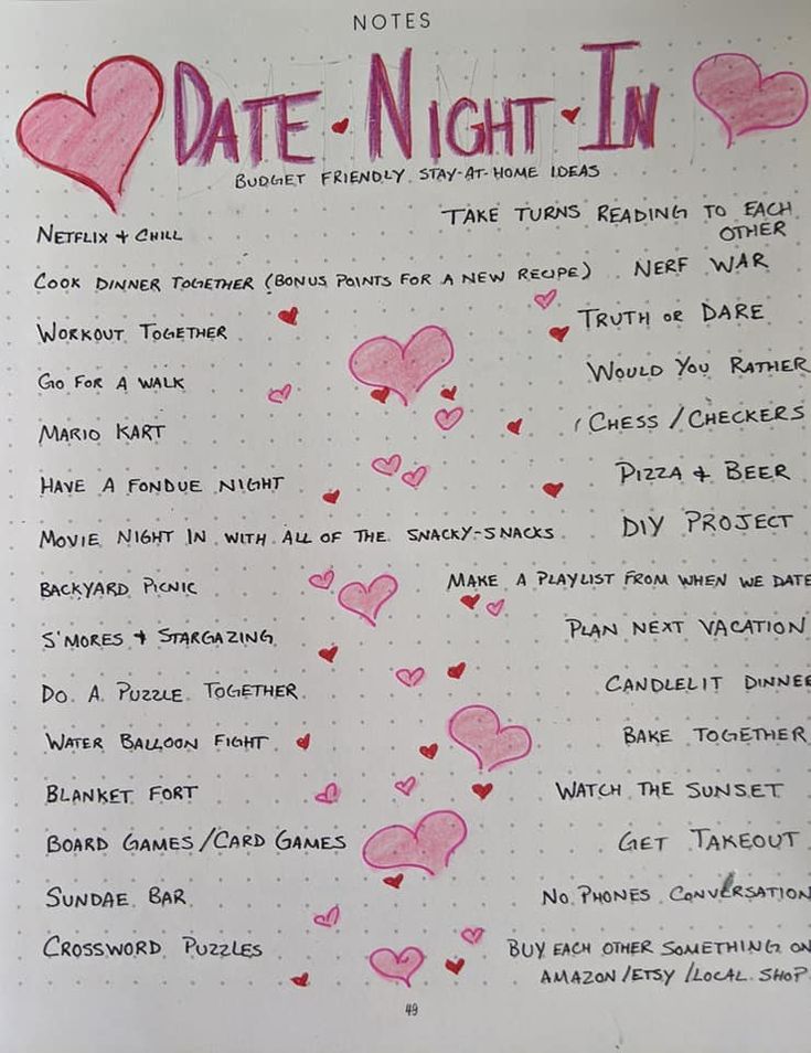 a notebook with pink hearts and the words date night in