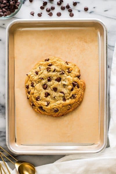 a cookie sitting on top of a baking pan