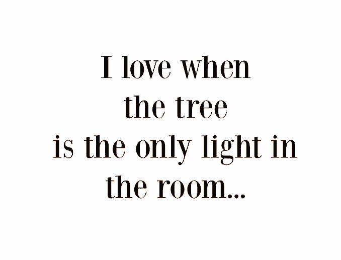 a black and white photo with the words i love when the tree is the only light in the room