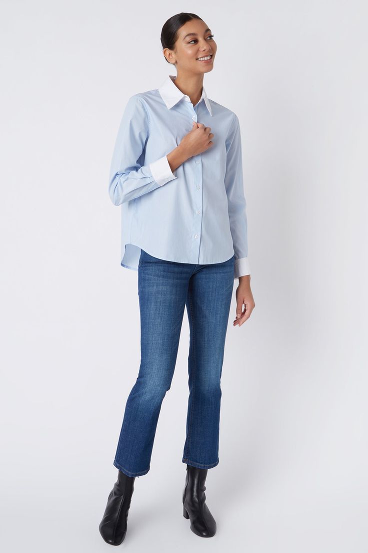 Simplicity is key with our new Classic button front shirt. Made in our European cotton with contrast collar & cuffs, this style is a great addition to your wardrobe. Dress it up or down, the options are endless. Classic collar and cuff construction, button front closure, easy fit, double back pleats, back yoke with our signature loop detail. - 100% Cotton - Made in NYC - Professional dry clean or machine wash - Our model is 5'9" wearing size S - Chest 40", Hip 43", Length 26" Orders are processe Classic Button-up Top With Contrast Collar, Blue Shirt With Button Cuffs And Shirttail Hem, Blue Shirt With Striped Cuffs For Work, Blue Striped Cuffs Shirt For Workwear, Workwear Button-up Top With Striped Cuffs, Button-up Tops With Striped Cuffs For Daywear, Workwear Shirt With Contrast Spread Collar, Workwear Tops With Striped Cuffs And Spread Collar, Collared Shirt With Striped Cuffs For Work