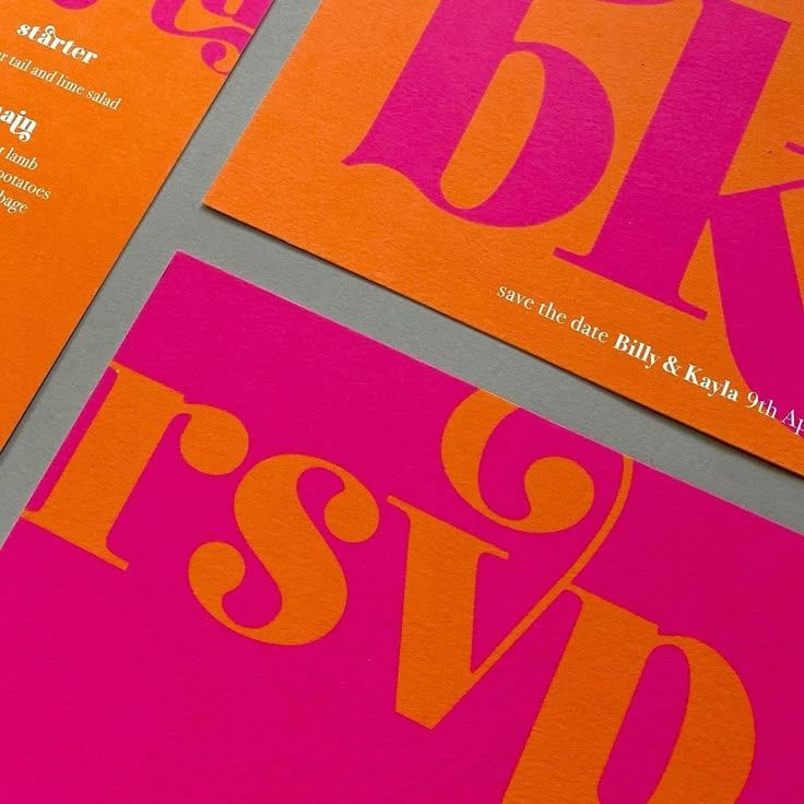 two orange and pink business cards with the letter b is for b & w on them