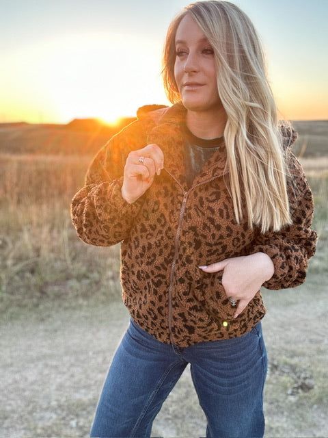 Make a statement in our new fleece leopard jackets! - 100% polyester - Dry clean only* - Pockets and hood - Full length zipper - Cozy with a satin lining for comfortable wear - Small fits 3-5, medium 6-8, large 8-10 - Lana is a size 4 wearing a small Hooded Leopard Print Winter Outerwear, Fall Leopard Print Hooded Outerwear, Hooded Leopard Print Outerwear For Fall, Cozy Long Sleeve Outerwear In Leopard Print, Cozy Long Sleeve Leopard Print Outerwear, Leopard Jacket, Fleece Jacket, Full Length, Dry Clean