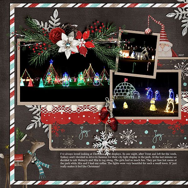 a scrapbook page with christmas lights and snowflakes on the pages, including an image of santa's sleigh