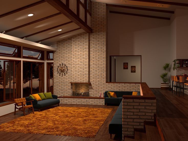 a living room filled with furniture next to a fire place under a roof covered in windows