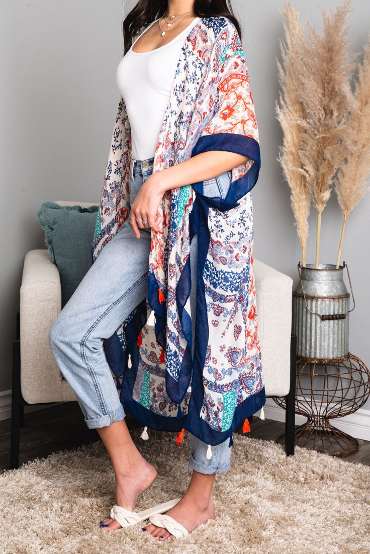 Get ready to make a statement with our Alina Paisley Floral Patchwork Kimono! Perfect for any occasion, this kimono features vibrant paisley and floral prints, creating a unique and eye-catching look. With its lightweight and flowy design, it's the perfect addition to your wardrobe. Perfect for both beaches and festivals! 100% Viscose One Size Fits Most 0-14 Length: 38" Bust: 36" Bohemian Patterned Kimono With Vibrant Print, Casual Spring Paisley Print Kimono, Spring Bohemian Paisley Print Kimono, Flowy Patterned Kimono For Festivals, Festival Flowy Patterned Kimono, Blue Bohemian Rayon Kimono, Casual Summer Kimono With Paisley Print, Casual Summer Paisley Print Kimono, Flowy Boho Print Patterned Kimono