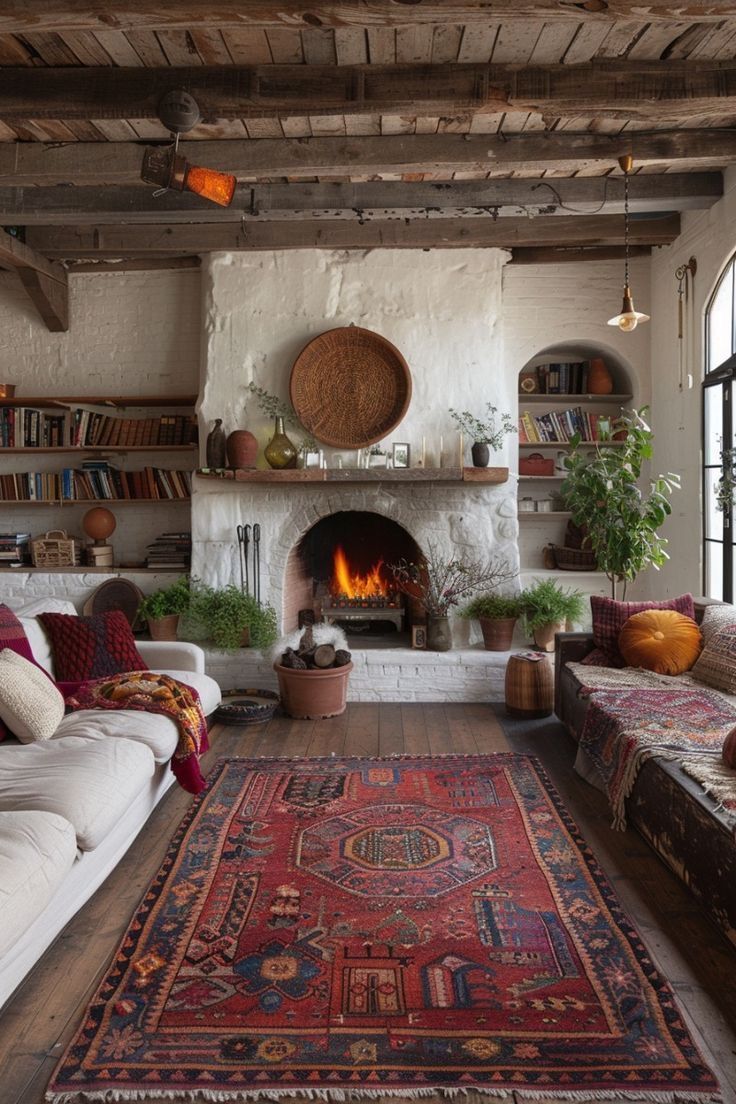 a living room filled with furniture and a fire place