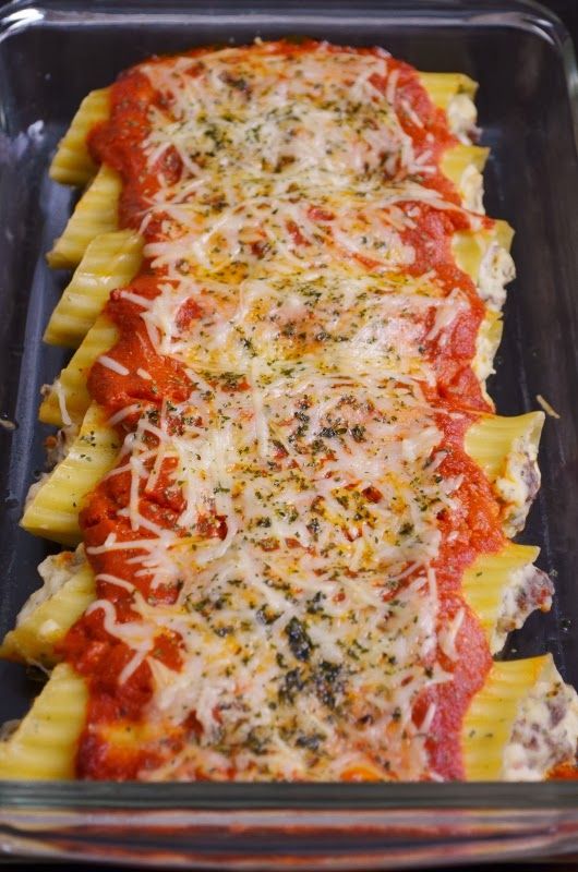 a casserole dish filled with pasta and sauce