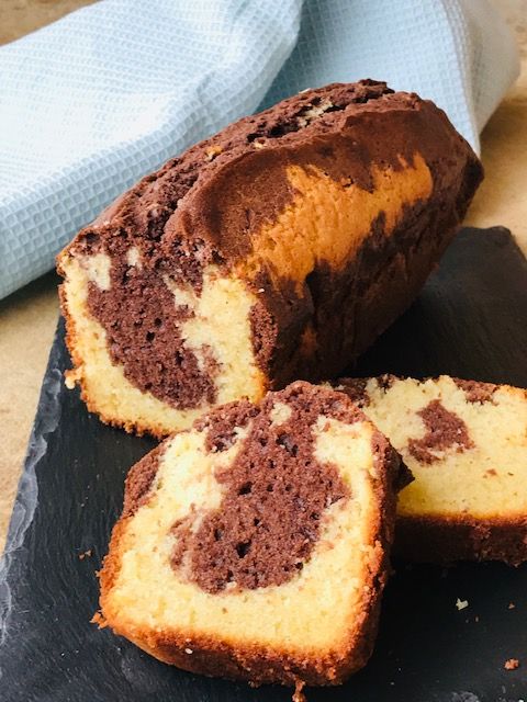 sliced chocolate marbled cake on slate platter