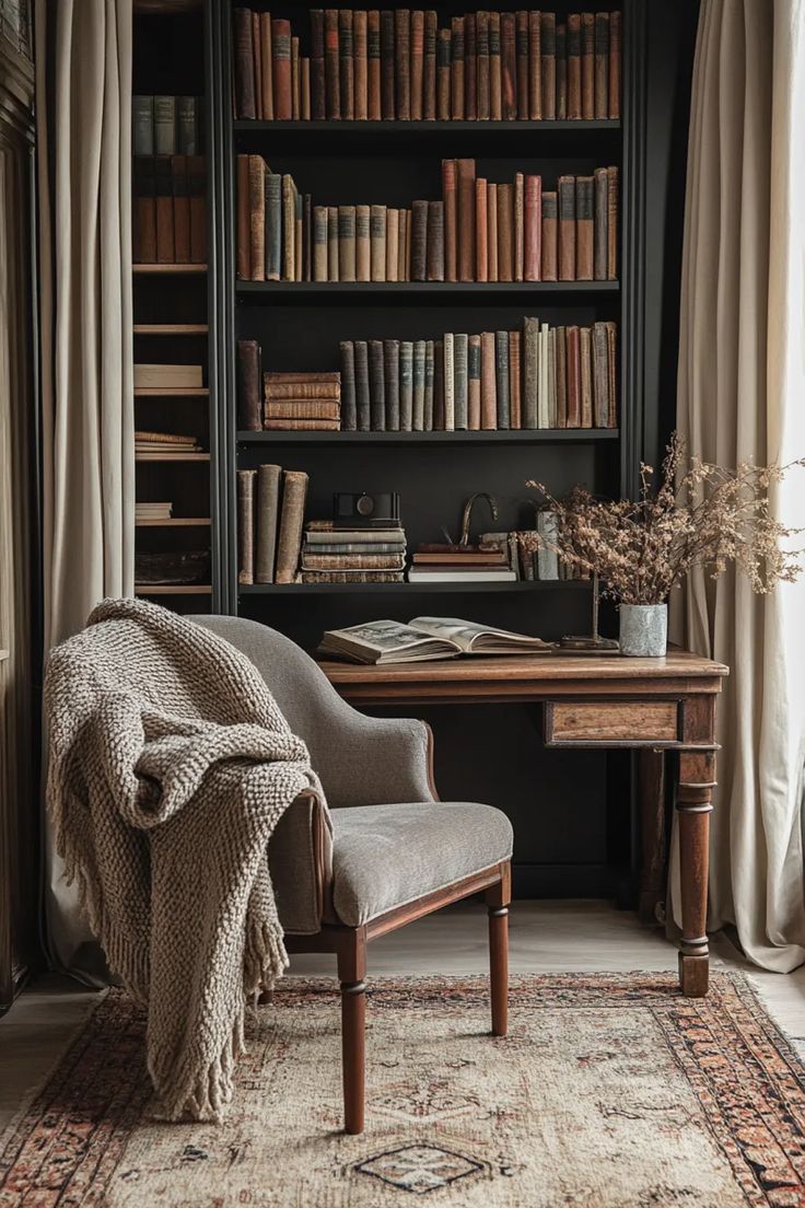 a chair sitting in front of a bookshelf filled with lots of books on top of a wooden table