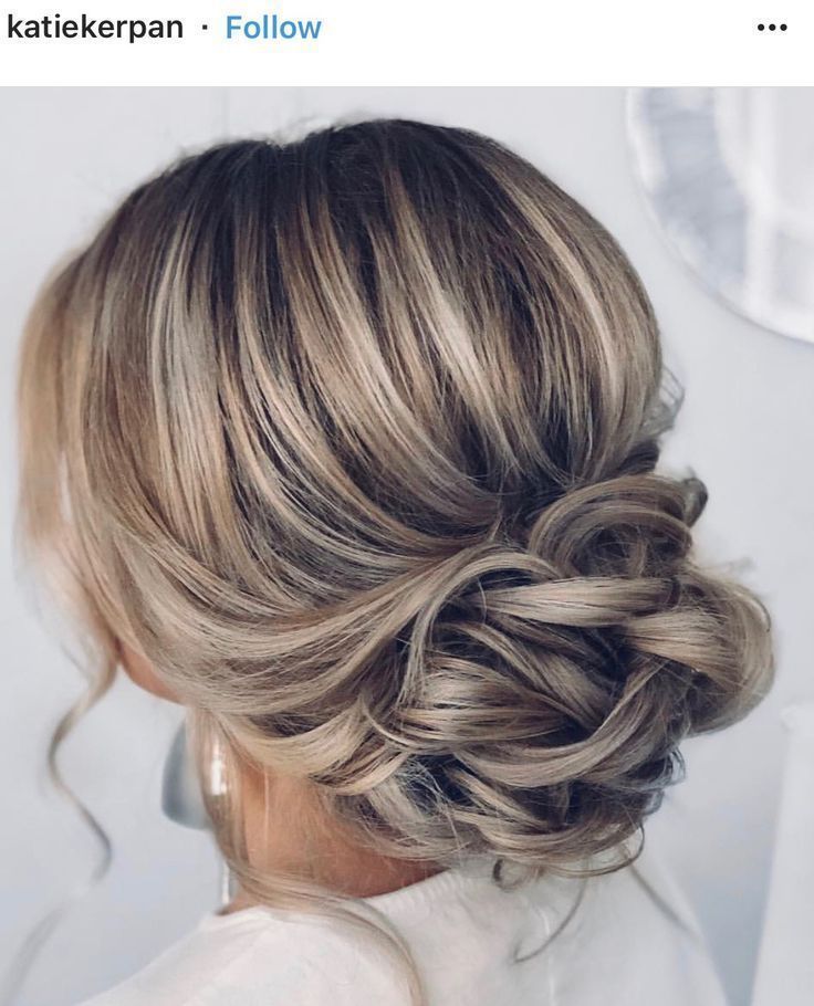 a woman with blonde hair in a messy updo is seen on the instagram page