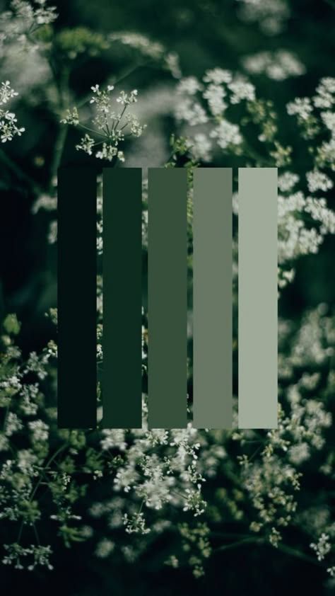 some white flowers and green bars in the background with blurry lines on it's side