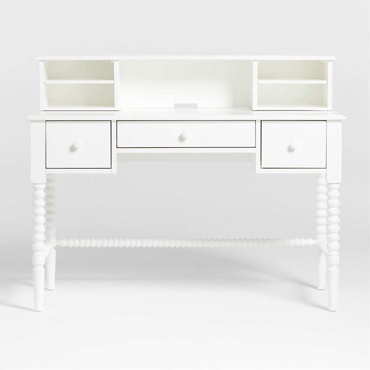 a white desk with two drawers and one drawer on the top, in front of a white background