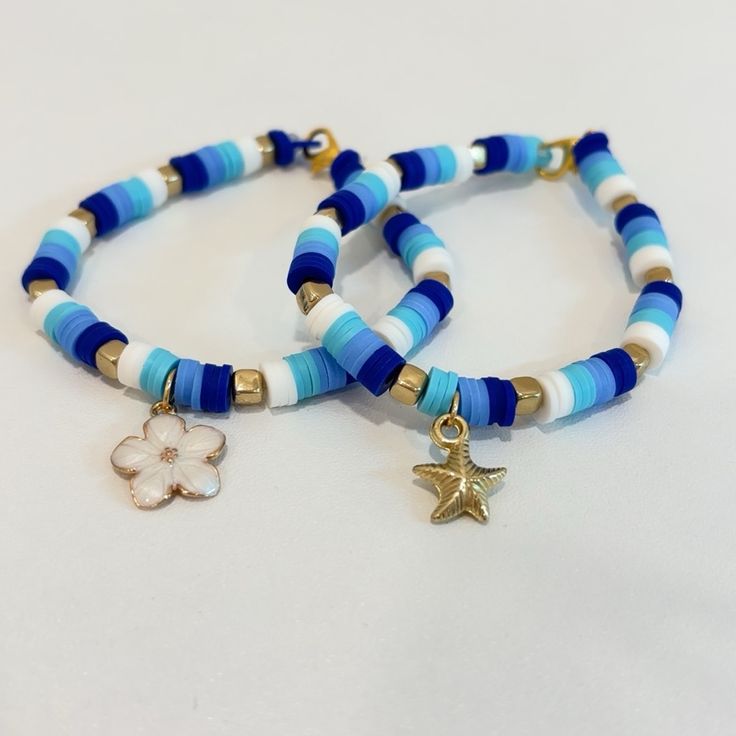 Handmade Clay Bead Bracelet Three Tone Blue W/ White And Gold. Flower Or Starfish Charm, Message Me About Which One You Prefer! Blue Bracelets Clay Beads, Clay Bead Bracelet Ideas For Your Crush, Wax Cord Bracelet With Beads, Steelers Clay Bead Bracelet, Bracelets With Flat Beads, Polymer Bead Bracelets Ideas, Clay Bead Bracelets With Charms, Starfish Clay Bead Bracelet, Cute Bracelet Inspo Clay Beads