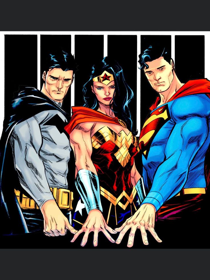 superman, wonder woman and man standing next to each other in front of jail bars