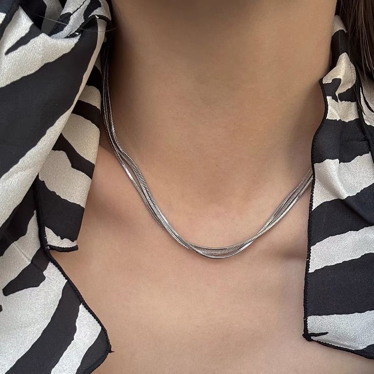 Layer up with this cool silver snake chain Platinum-plated brass Size:48inches Weight:18g Trendy Snake Chain Clavicle Necklace, Double Snake Chain Necklace, Trendy Metal Snake Chain Necklace, Trendy Metal Snake Chain Necklace With Adjustable Chain, Silver Stainless Steel Snake Chain Necklace, Silver Stainless Steel Snake Chain Jewelry, Silver Metal Snake Chain Necklace, Trendy Silver Snake Chain Jewelry, Metal Snake Chain Necklace Gift