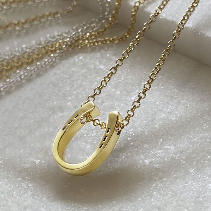 Classique Horseshoe & Chain Necklace - www.urban-equestrian.com Formal Yellow Gold Horseshoe Jewelry, Classic Yellow Gold Horseshoe Jewelry, Classic Horseshoe Jewelry, Elegant Gold Horseshoe Jewelry, Horseshoe-shaped Jewelry With Adjustable Chain, Gold Horseshoe Necklace For Formal Occasions, Formal Gold Horseshoe Necklace, Elegant Yellow Gold Horseshoe Necklace, Elegant Gold Horseshoe Necklace