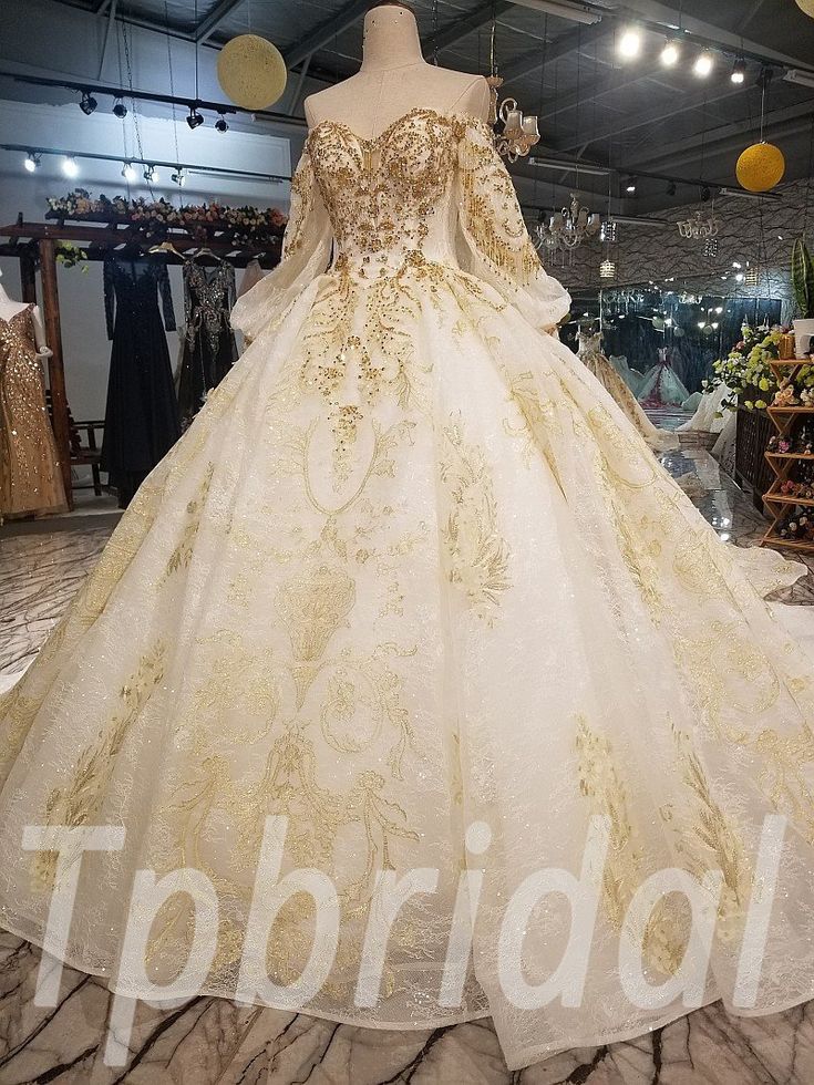 a wedding dress on display in a store