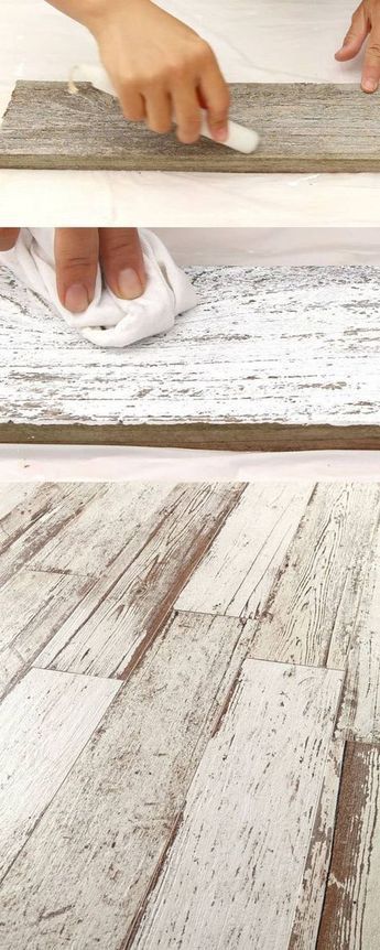 a person using a mouse on top of a wood planked floor with white paint